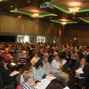 Delegates listening to the themes that they are going to vote on in the afternoon